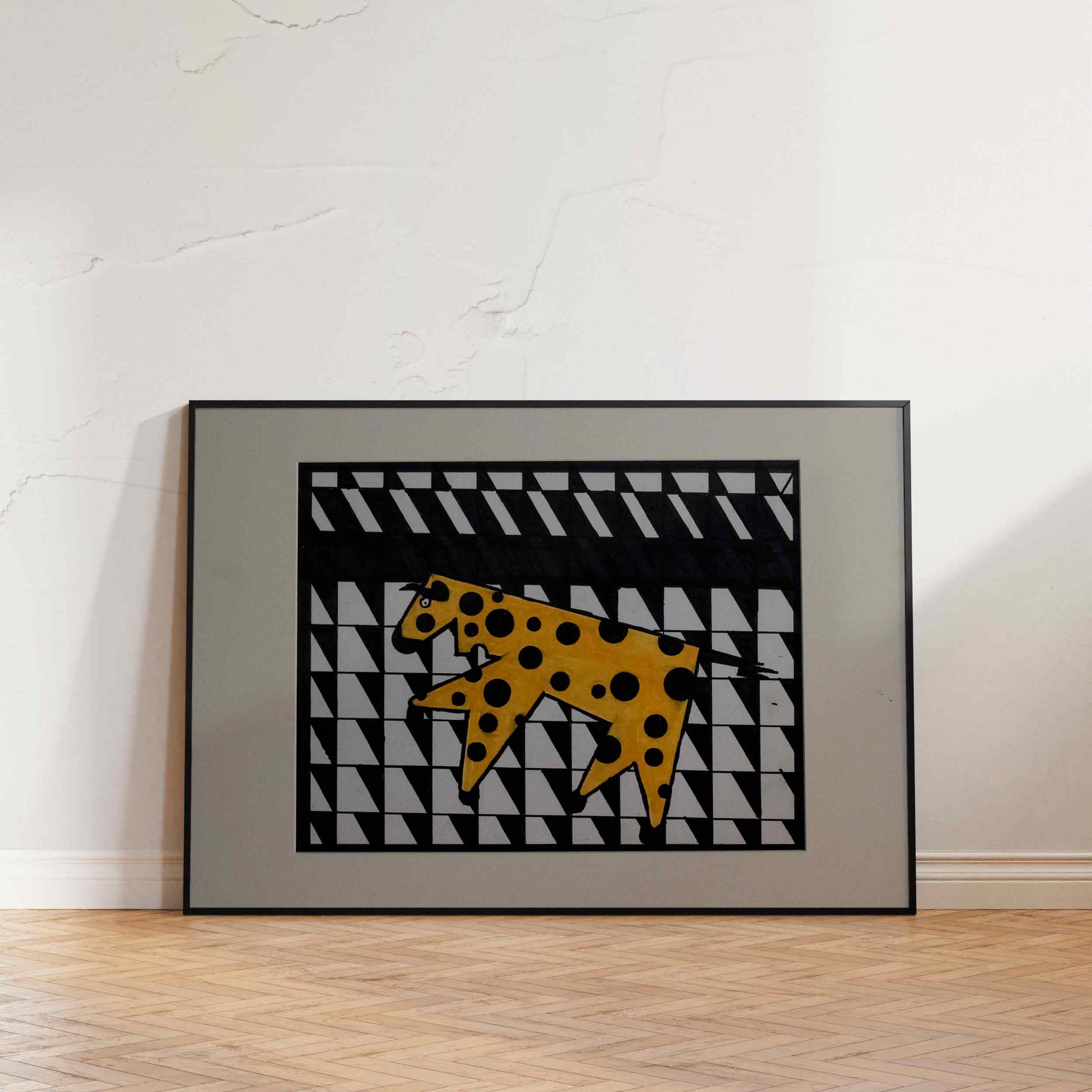 "Geometric Beast”, A bold cubist artwork of a powerful bull in overlapping gray polygons with splashes of orange and black polka dots.