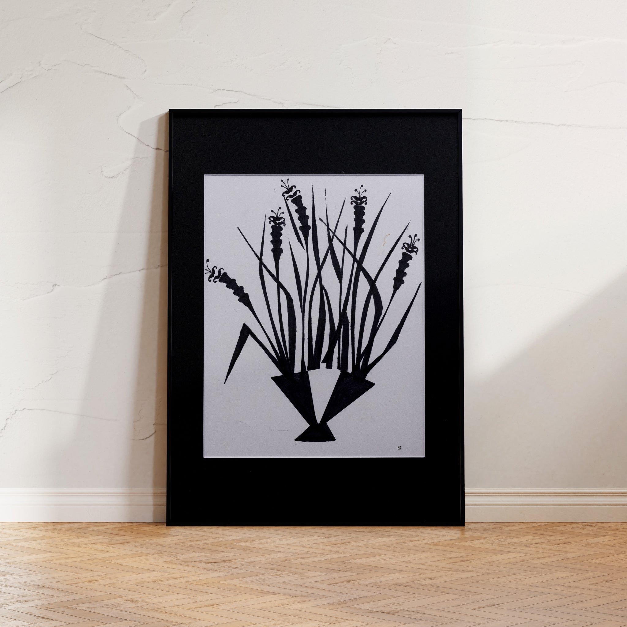 A black and white print titled "Mono No Aware," featuring a distorted vase and graphic floral designs, symbolizing life's fleeting beauty in a minimalist style.